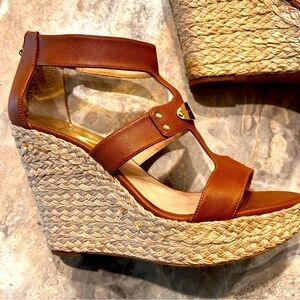 Size 10 cognac colored Michael Kors wedges.